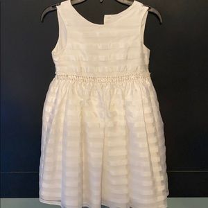 Baptism dress or just a white dress.
